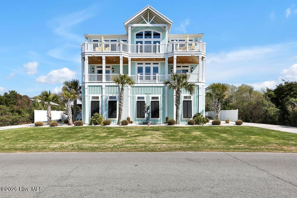 Photo of 4314 E Dolphin Drive, Oak Island, NC 28465 (MLS # 100564206)