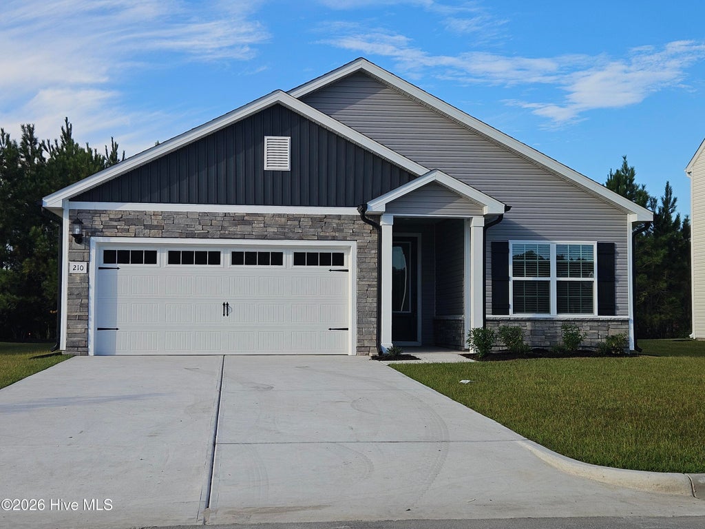 Photo of 210 S Umbrella Palm Drive, Hampstead, NC 28443 (MLS # 100610577)