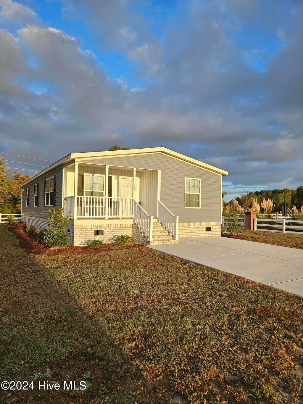Photo of 864 Yaupon Drive SW, Calabash, NC 28467 (MLS # 100569261)