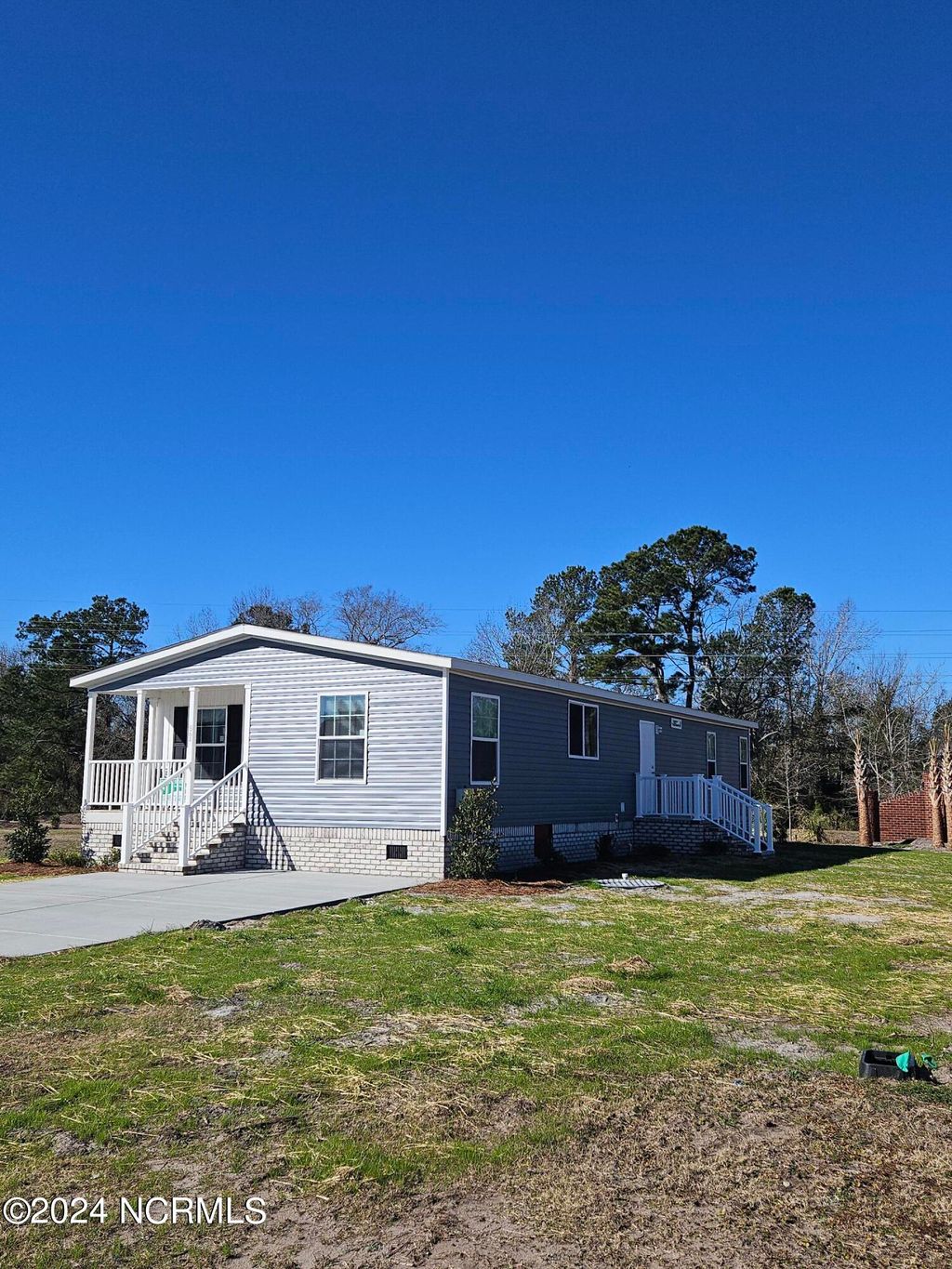 Photo of 864 Yaupon Drive SW, Calabash, NC 28467 (MLS # 100569261)