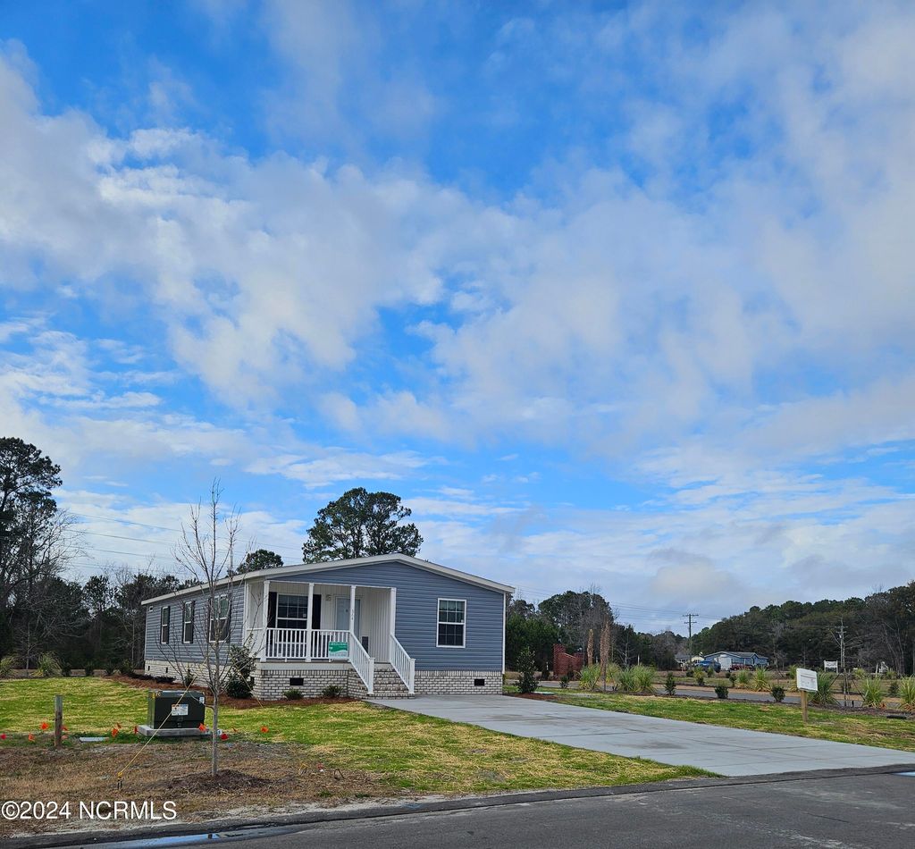 Photo of 864 Yaupon Drive SW, Calabash, NC 28467 (MLS # 100569261)