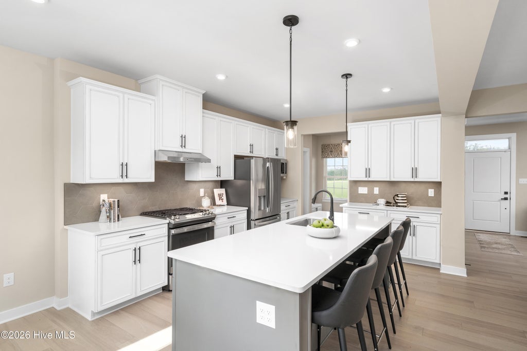 Photo of 1425 Whistling Straits Way, Sunset Beach, NC 28468 (MLS # 100610699)
