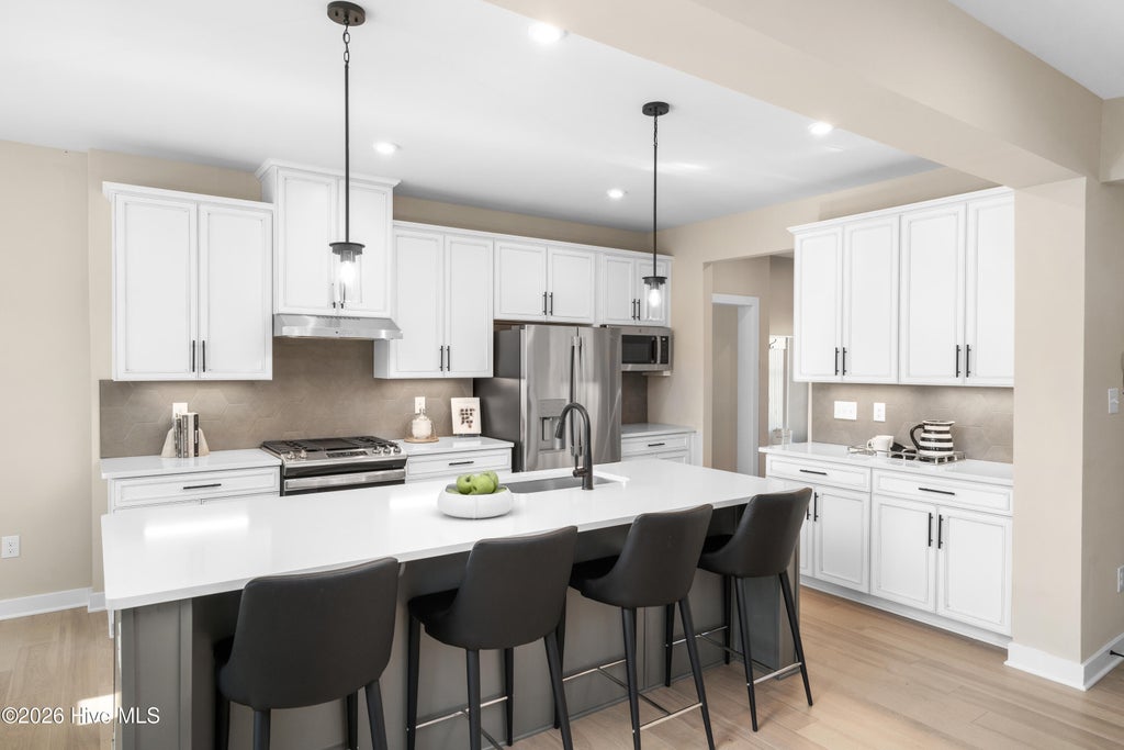 Photo of 1425 Whistling Straits Way, Sunset Beach, NC 28468 (MLS # 100610699)