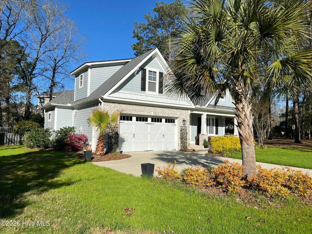 Photo of 909 Oyster Pointe Drive, Sunset Beach, NC 28468 (MLS # 100542073)