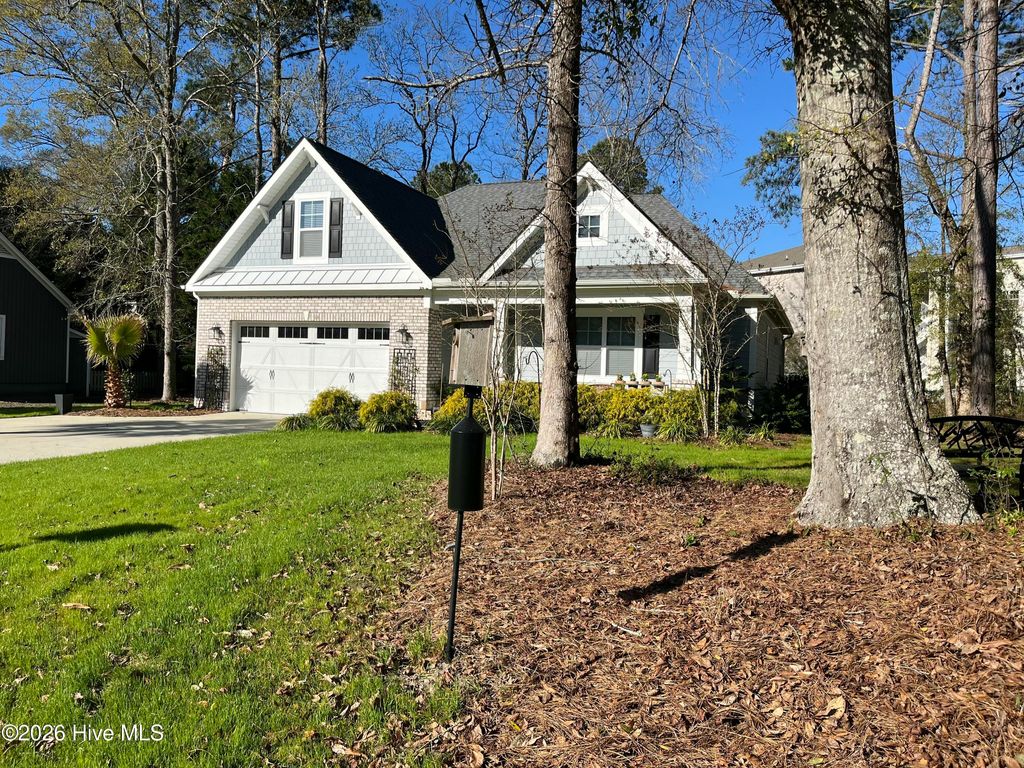 Photo of 909 Oyster Pointe Drive, Sunset Beach, NC 28468 (MLS # 100542073)
