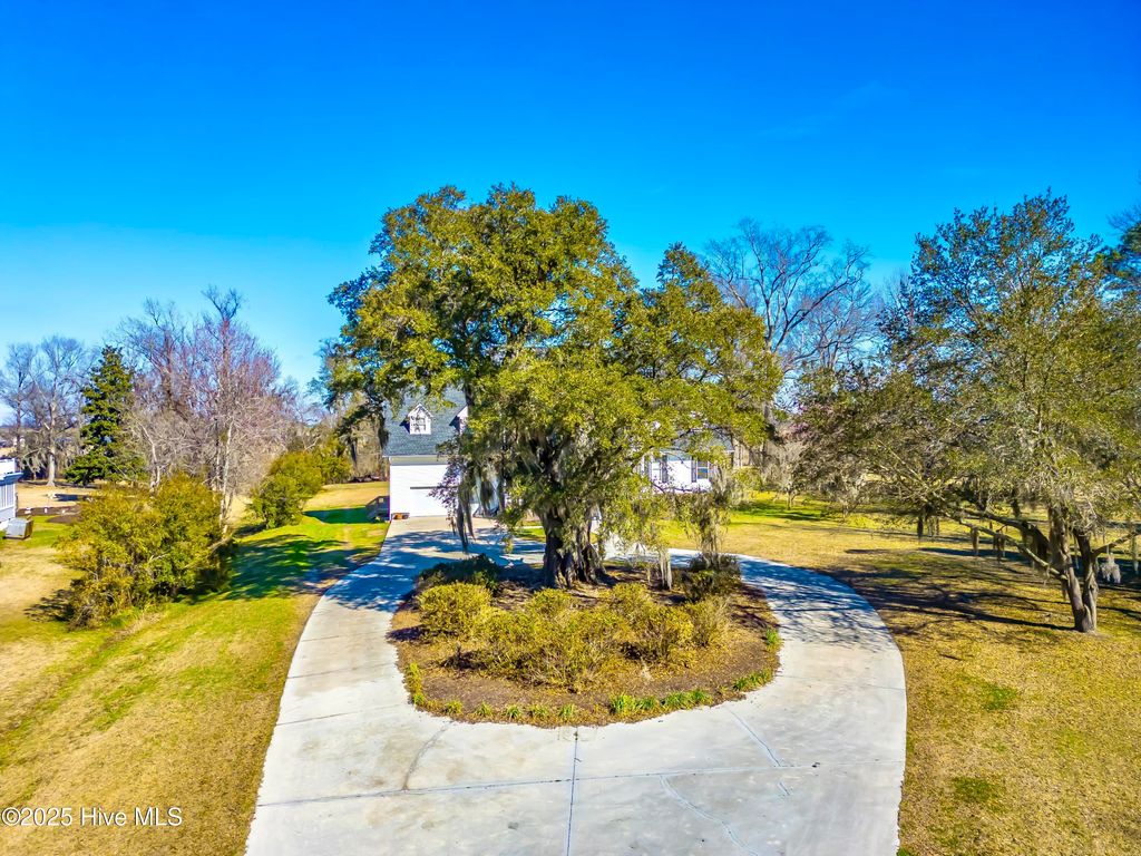 Photo of 1228 Liberty Landing Road SE, Winnabow, NC 28479 (MLS # 100494735)