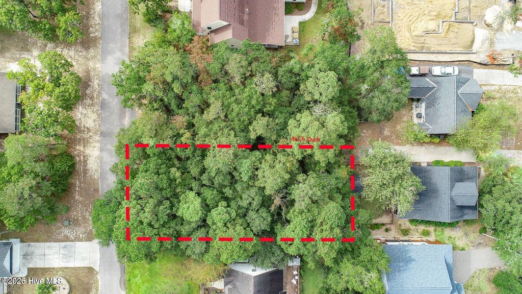 Photo of 117 NW 4th Street, Oak Island, NC 28465 (MLS # 100553139)