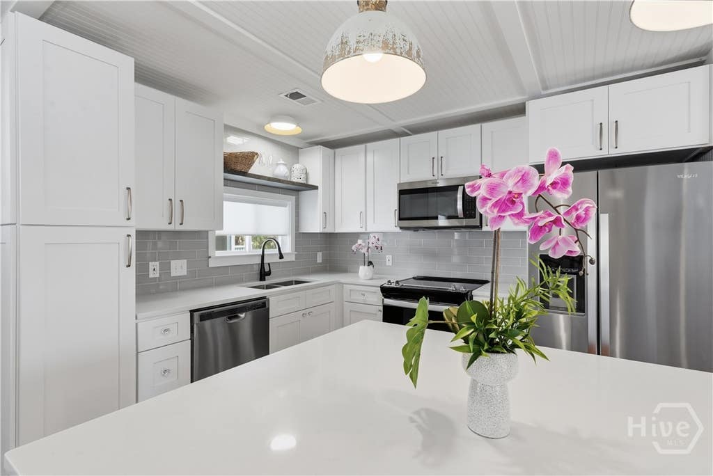 Photo of 132 Pelican Drive, Tybee Island, GA 31328 (MLS # SA363015)
