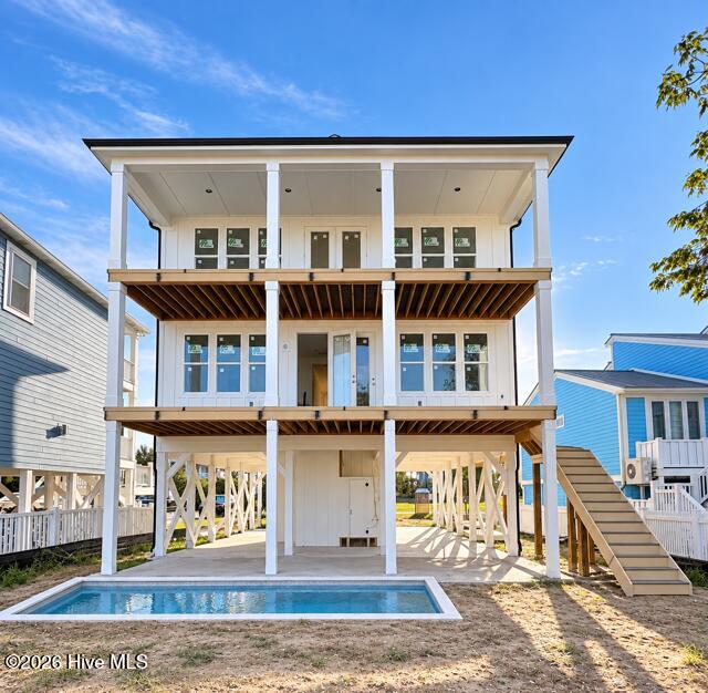 Photo of 147 Swordfish Drive, Holden Beach, NC 28462 (MLS # 100541716)