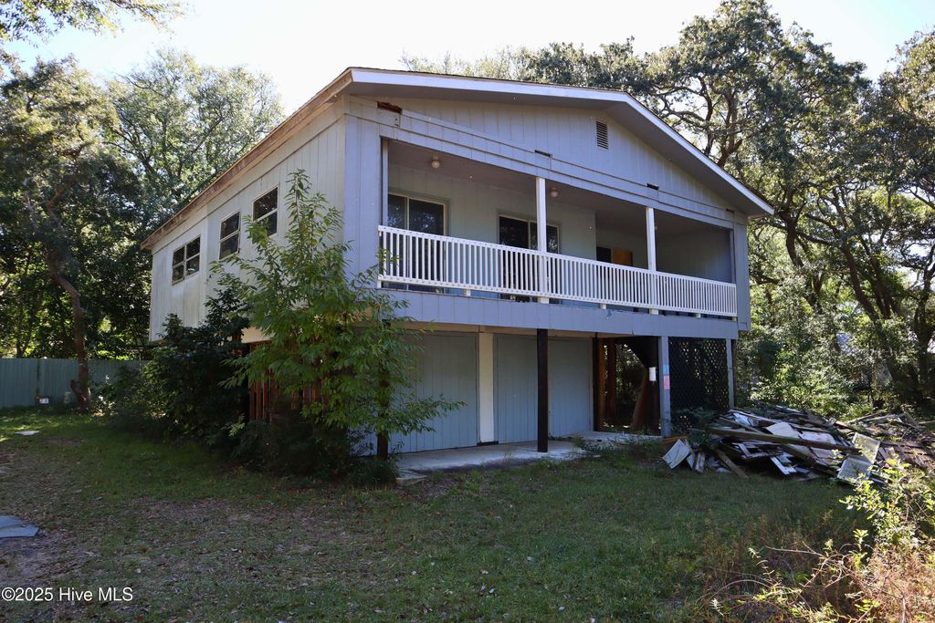Photo of 116 SW 6th Street, Oak Island, NC 28465 (MLS # 100537469)
