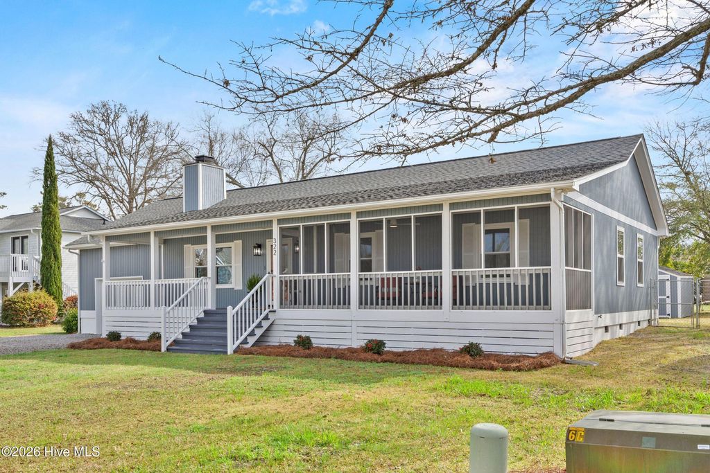 Photo of 322 NE 57th Street, Oak Island, NC 28465 (MLS # 100559146)