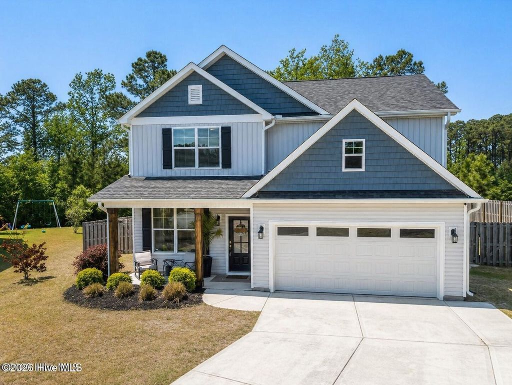 Photo of 1011 E Arboria Drive, Hampstead, NC 28443 (MLS # 100569792)
