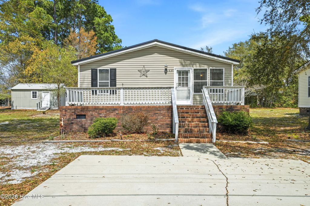 Photo of 635 Dogwood Drive, Sunset Beach, NC 28468 (MLS # 100565641)