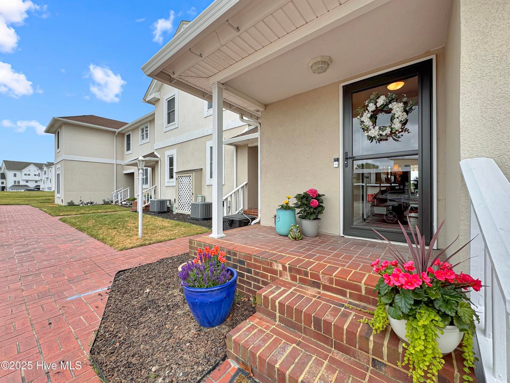 Photo of 103 Continental Plaza Drive #5, Elizabeth City, NC 27909 (MLS # 100580633)