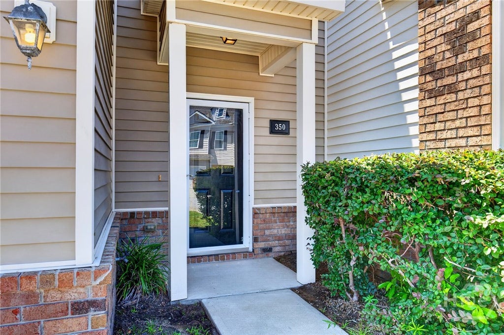 Photo of 350 Canyon Oak Loop, Richmond Hill, GA 31324 (MLS # SA359016)