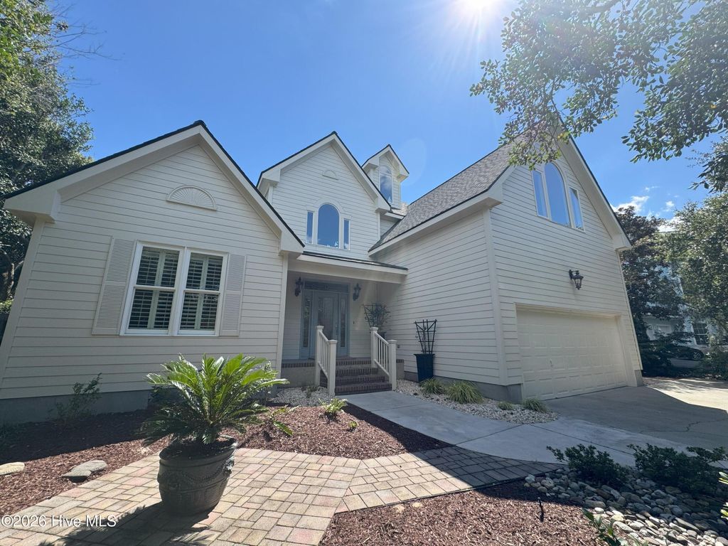 Photo of 573 Coral Ridge Road, Pine Knoll Shores, NC 28512 (MLS # 100564639)