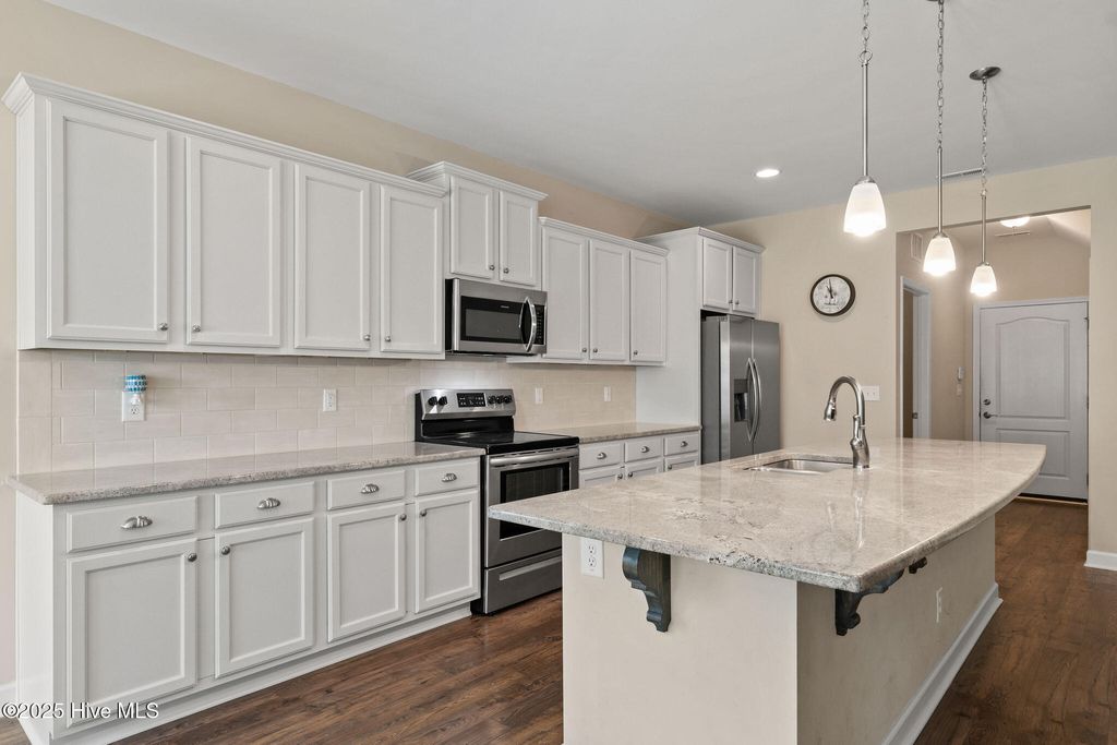 Photo of 23 Downy Drive, Hampstead, NC 28443 (MLS # 100513961)