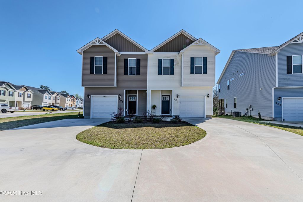 Photo of 403 Blockade Shoal Lane, Jacksonville, NC 28546 (MLS # 100565496)