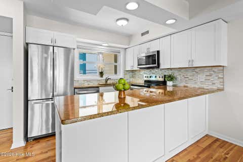 Tiny photo for 1403 Canal Drive # 10, Carolina Beach, NC 28428 (MLS # 100598877)