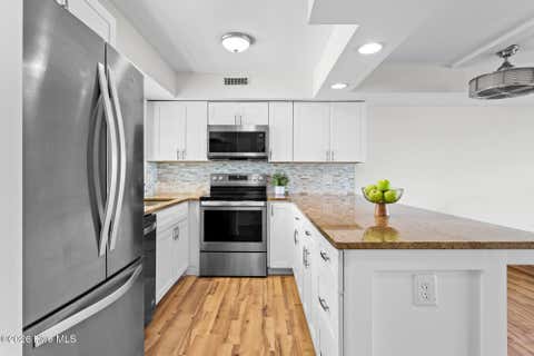 Tiny photo for 1403 Canal Drive # 10, Carolina Beach, NC 28428 (MLS # 100598877)