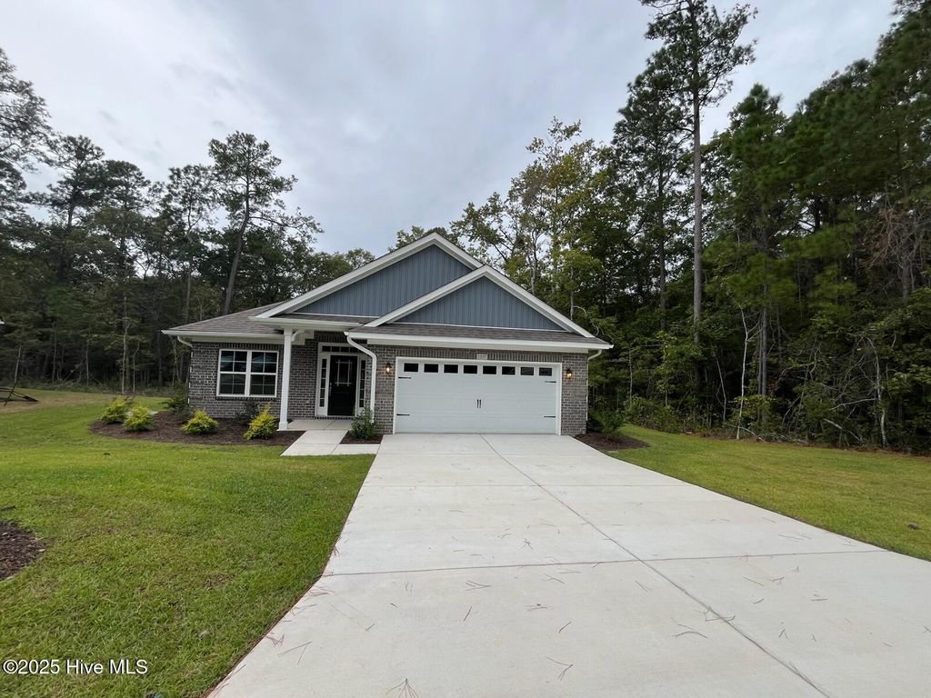 Photo of 1207 Mandevilla Drive SE, Bolivia, NC 28422 (MLS # 100420978)