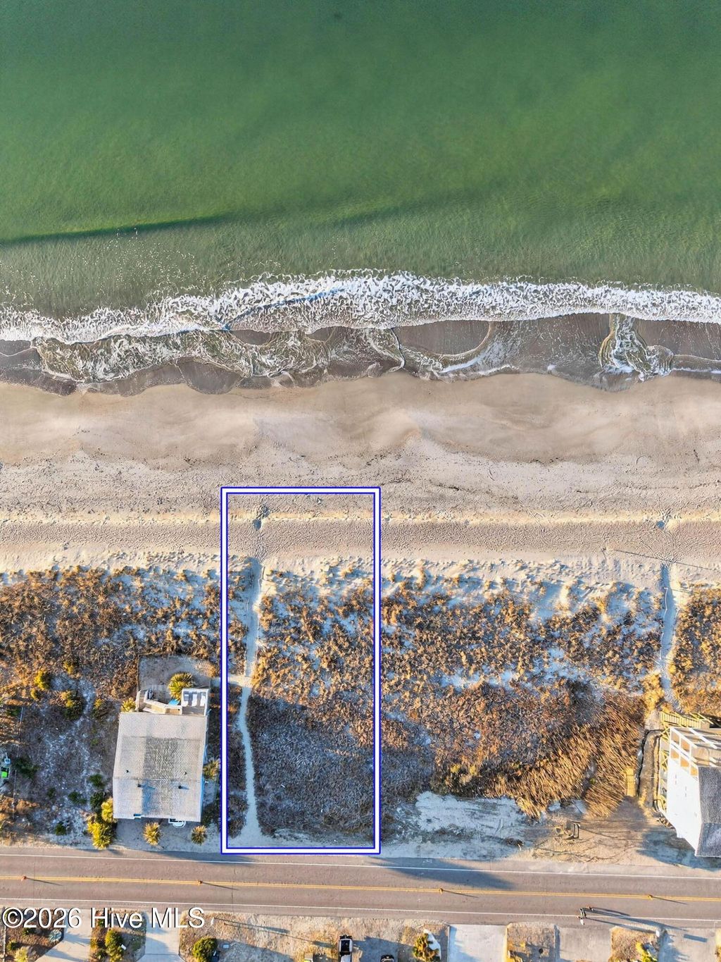 Photo of 5523 E Beach Drive, Oak Island, NC 28465 (MLS # 100554780)