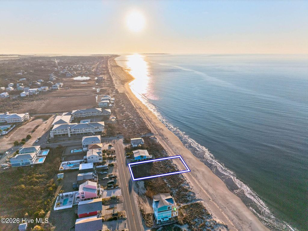 Photo of 5523 E Beach Drive, Oak Island, NC 28465 (MLS # 100554780)