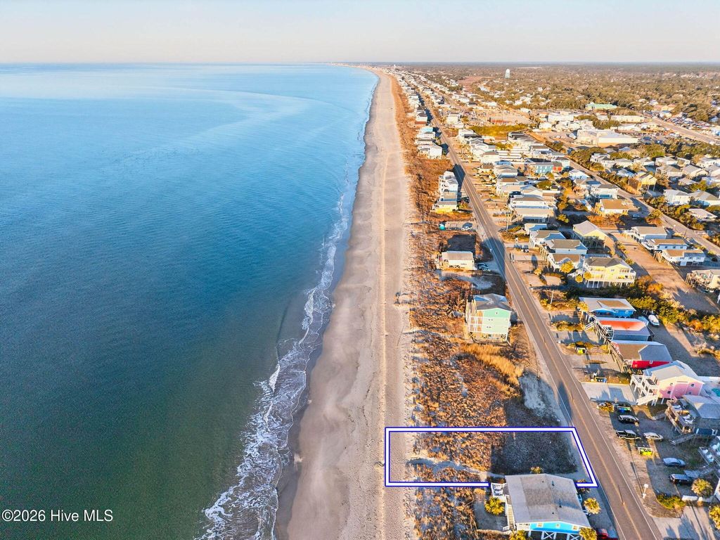 Photo of 5523 E Beach Drive, Oak Island, NC 28465 (MLS # 100554780)