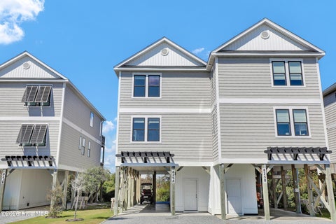 Photo of 825 N New River Drive, Surf City, NC 28445 (MLS # 100608025)