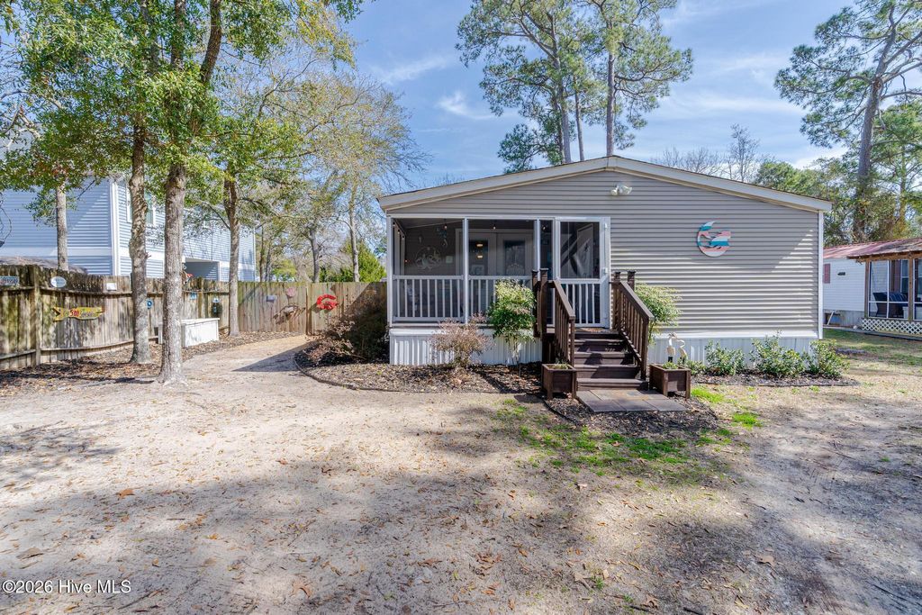 Photo of 254 NE 69th Street, Oak Island, NC 28465 (MLS # 100559189)