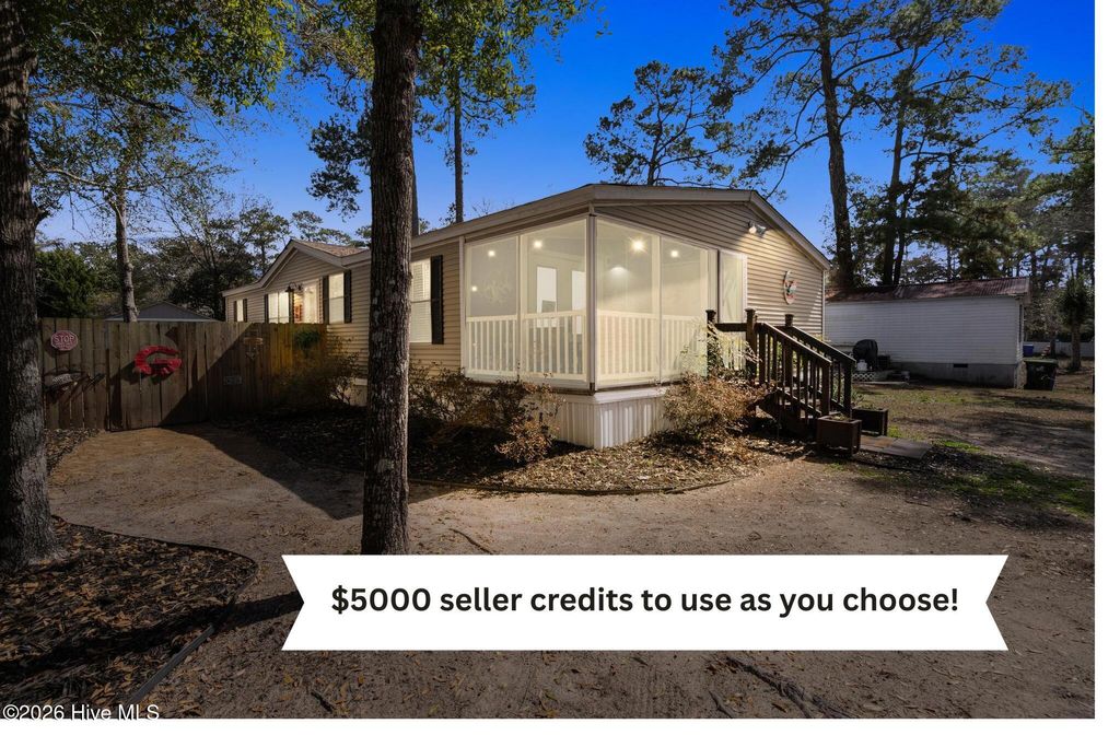 Photo of 254 NE 69th Street, Oak Island, NC 28465 (MLS # 100559189)