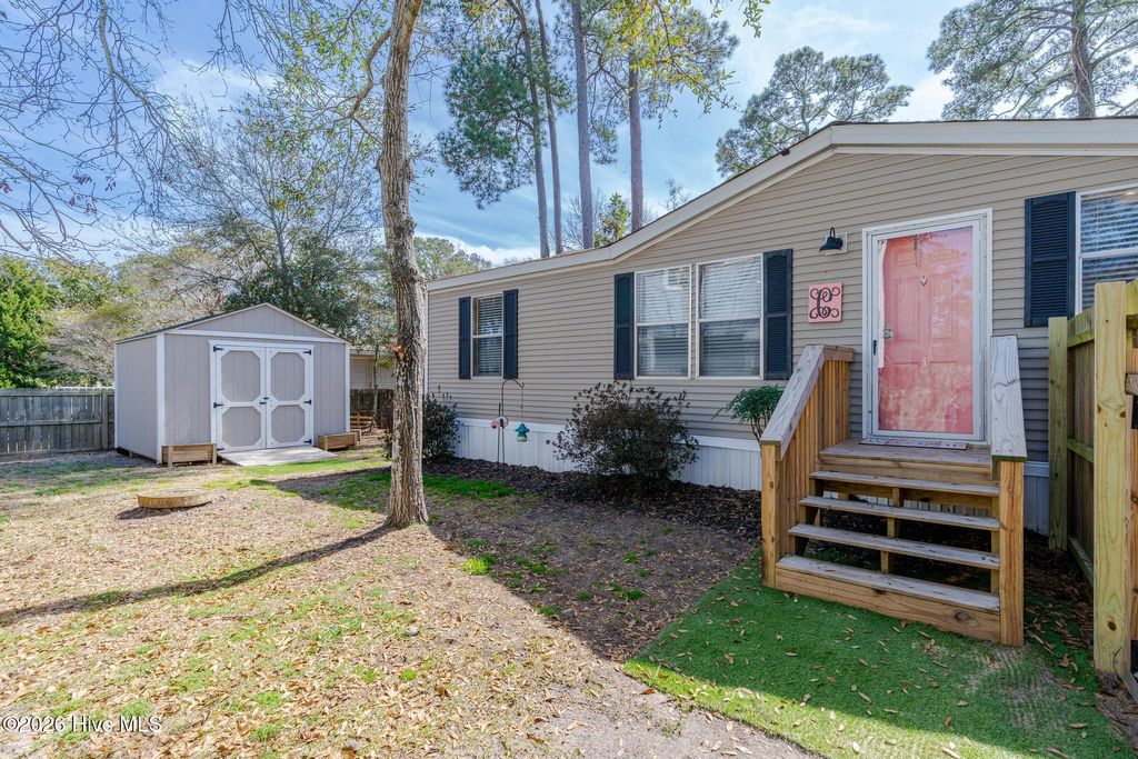 Photo of 254 NE 69th Street, Oak Island, NC 28465 (MLS # 100559189)
