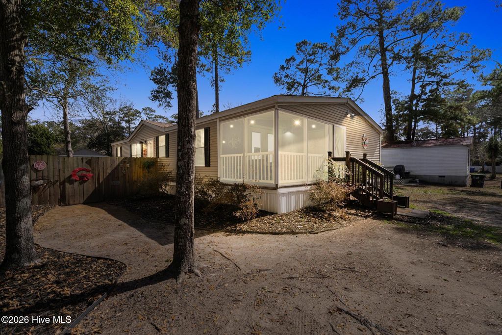 Photo of 254 NE 69th Street, Oak Island, NC 28465 (MLS # 100559189)