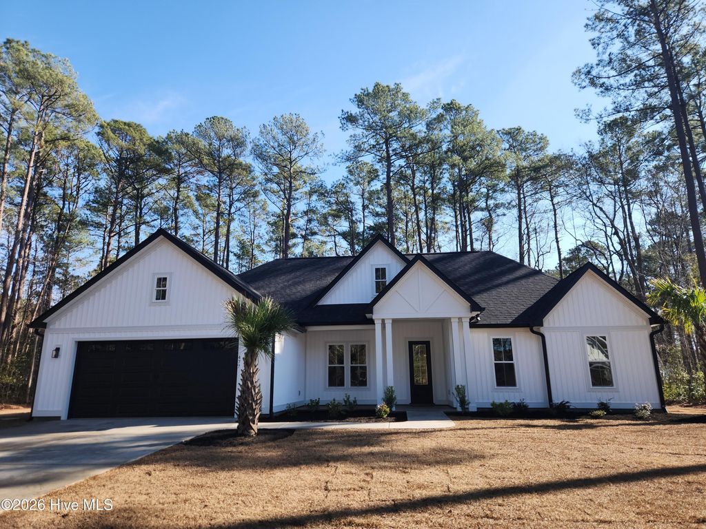 Photo of 477 Oakwood Drive NW, Calabash, NC 28467 (MLS # 100547826)