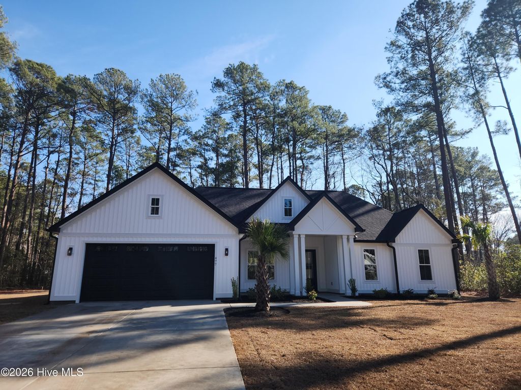 Photo of 477 Oakwood Drive NW, Calabash, NC 28467 (MLS # 100547826)