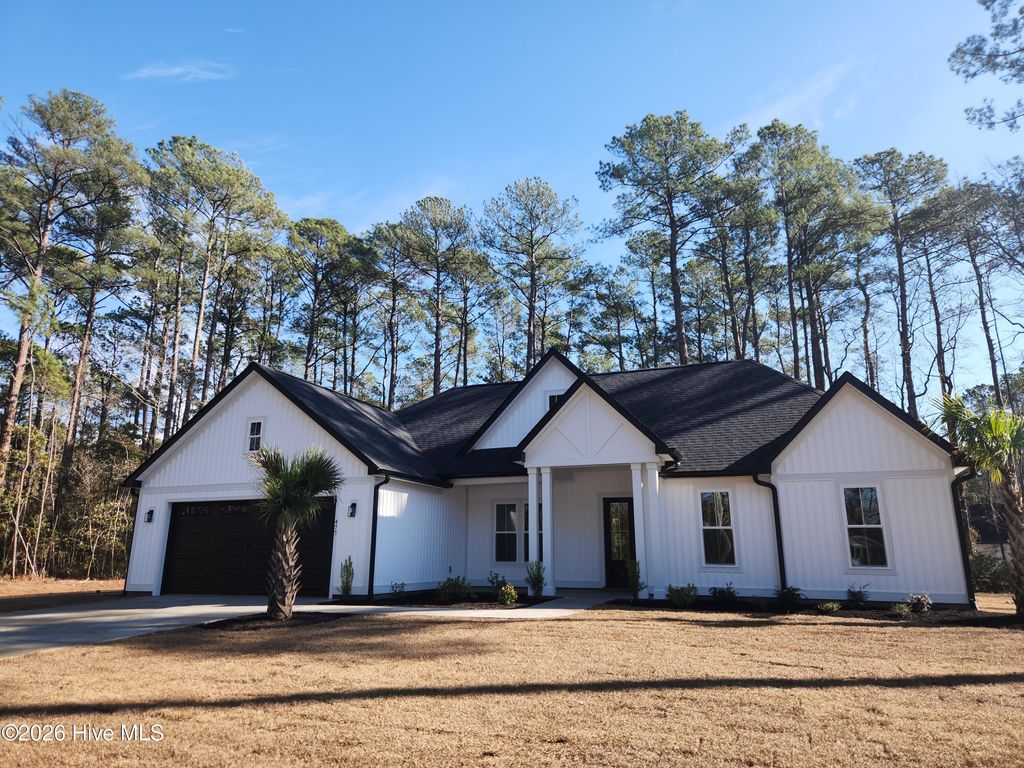 Photo of 477 Oakwood Drive NW, Calabash, NC 28467 (MLS # 100547826)
