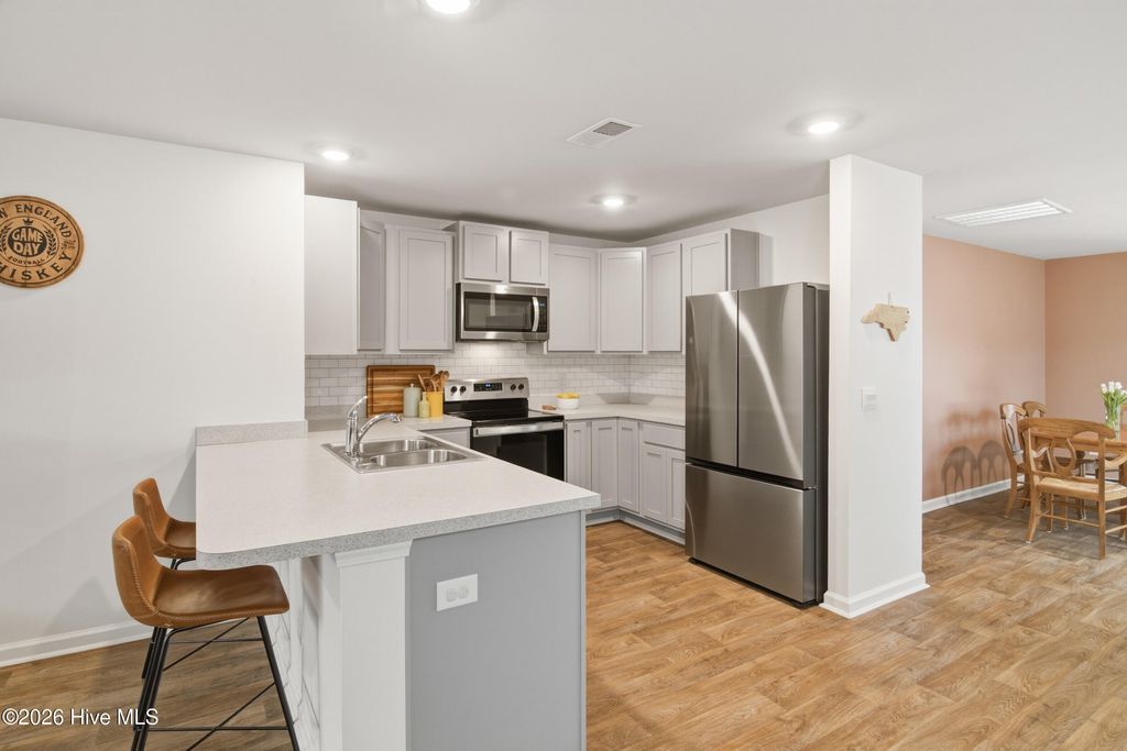 Photo of 1019 Course Lane, Surf City, NC 28445 (MLS # 100555979)