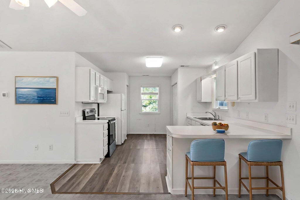 Photo of 212 NE 41st Street, Oak Island, NC 28465 (MLS # 100612198)