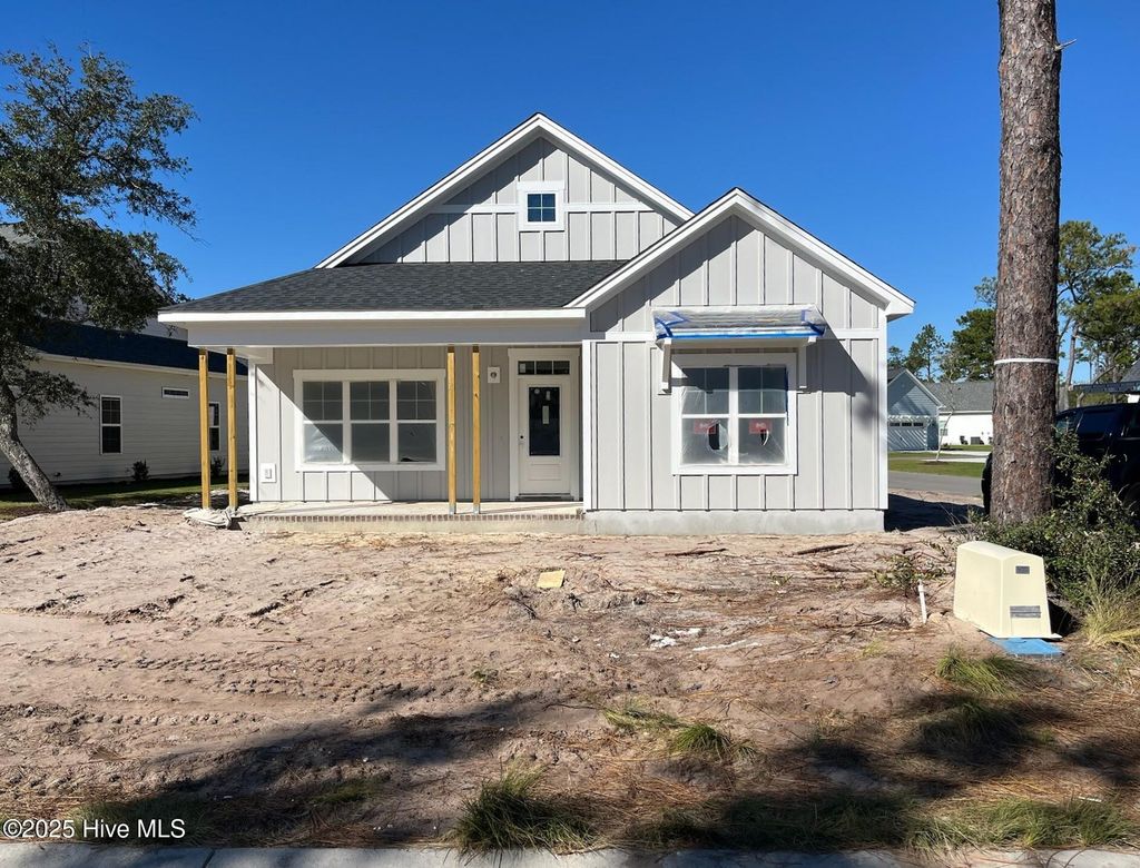 Photo of 2478 Lake Ridge Drive, Southport, NC 28461 (MLS # 100538492)