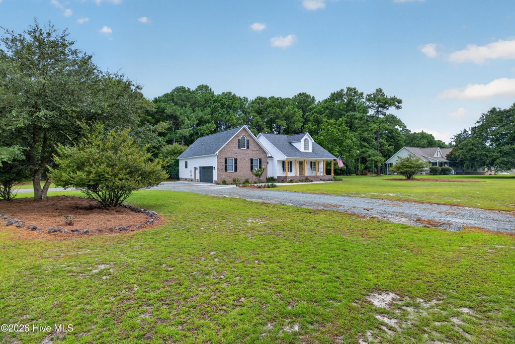 Photo of 21 Oyster Point Lane, Hampstead, NC 28443 (MLS # 100599771)