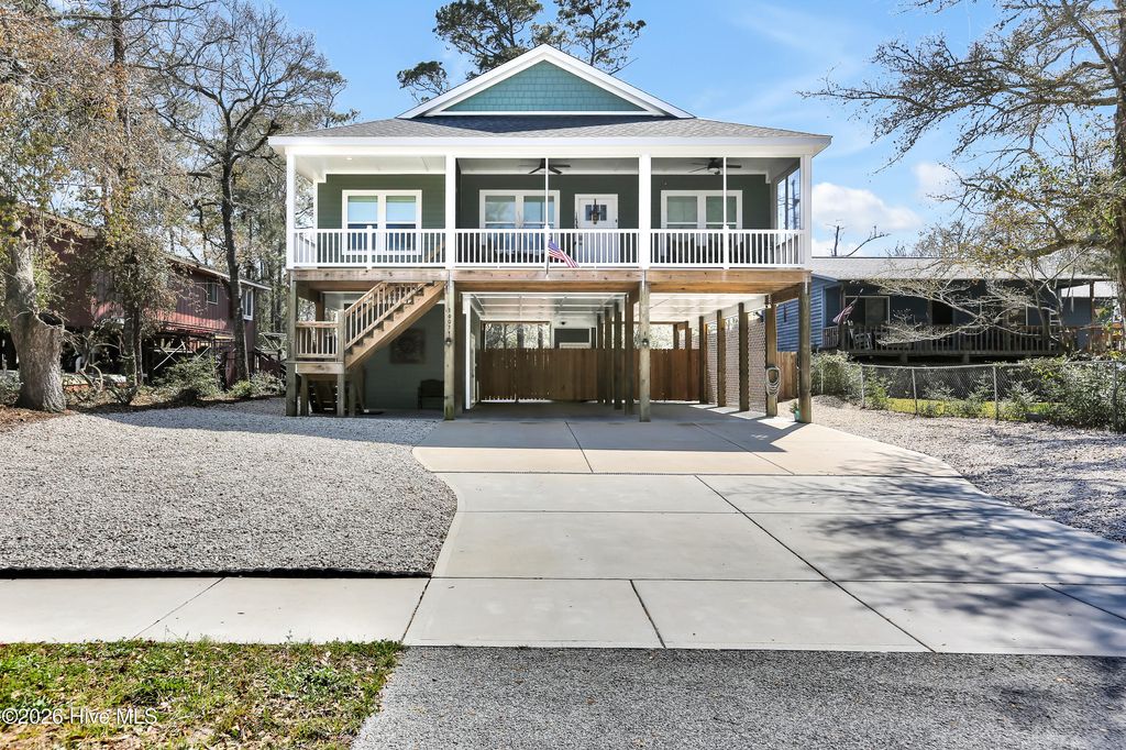 Photo of 3003 W Oak Island Drive, Oak Island, NC 28465 (MLS # 100564163)