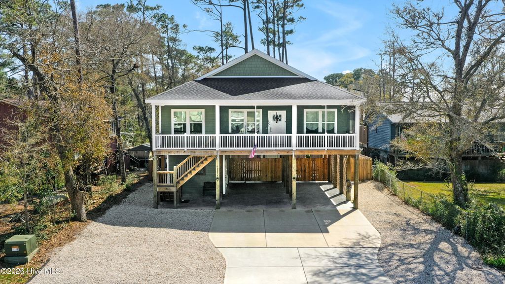 Photo of 3003 W Oak Island Drive, Oak Island, NC 28465 (MLS # 100564163)