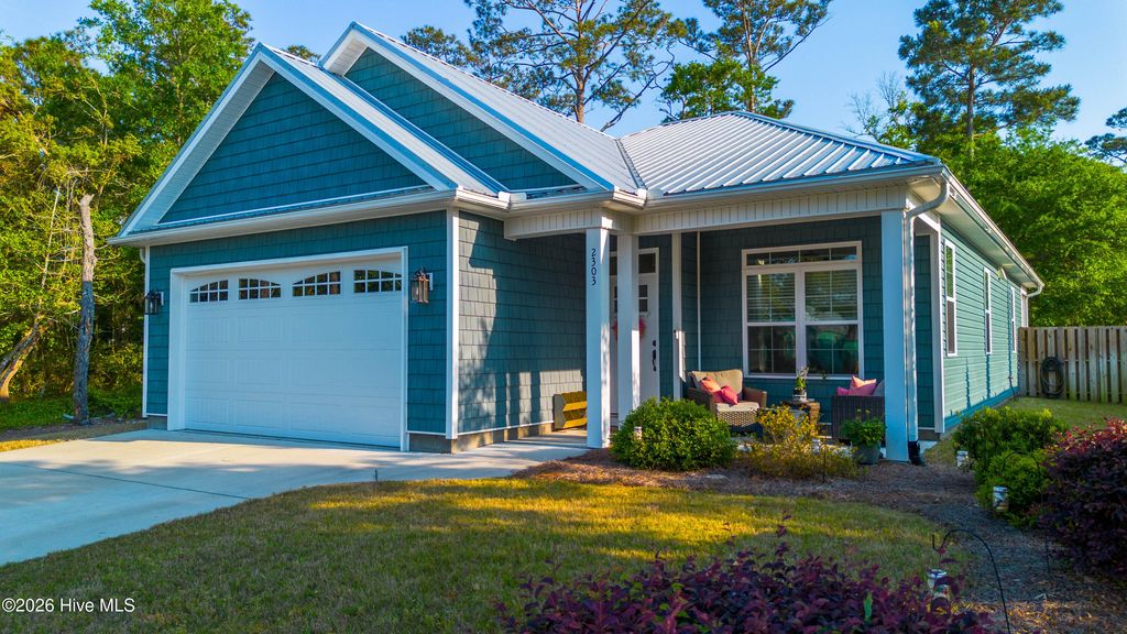 Photo of 2303 W Oak Island Drive, Oak Island, NC 28465 (MLS # 100570051)