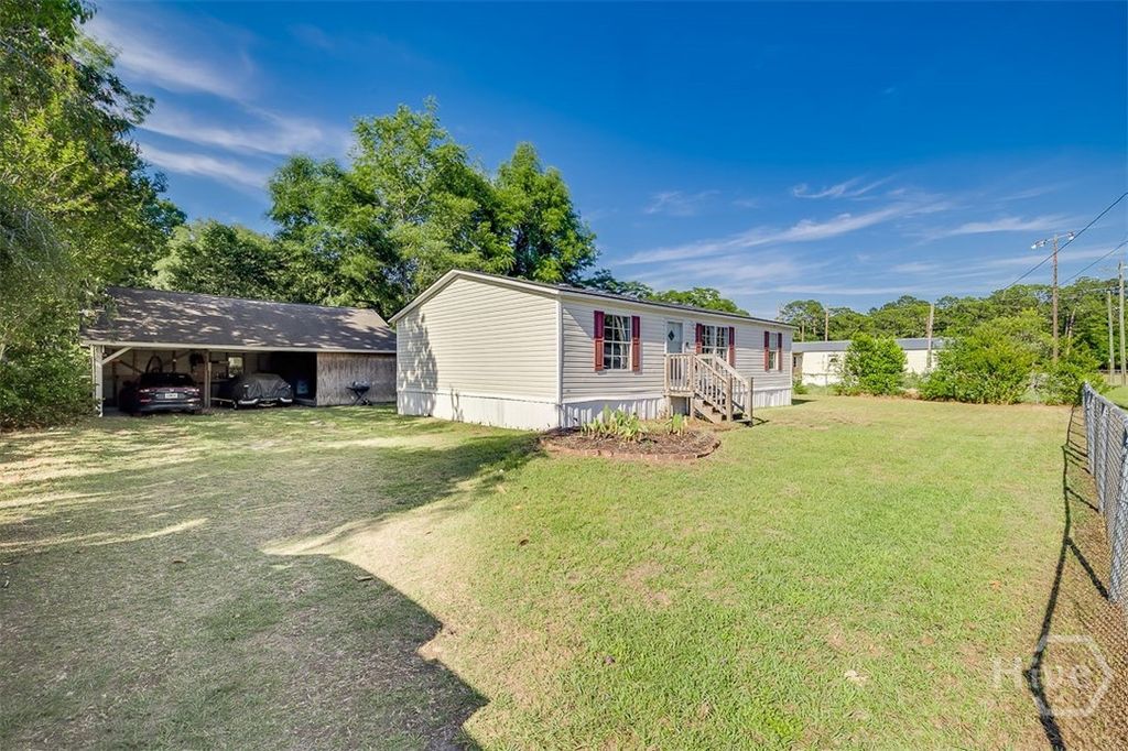 Photo of 114 Ogeechee Avenue, Meldrim, GA 31318 (MLS # SA355838)