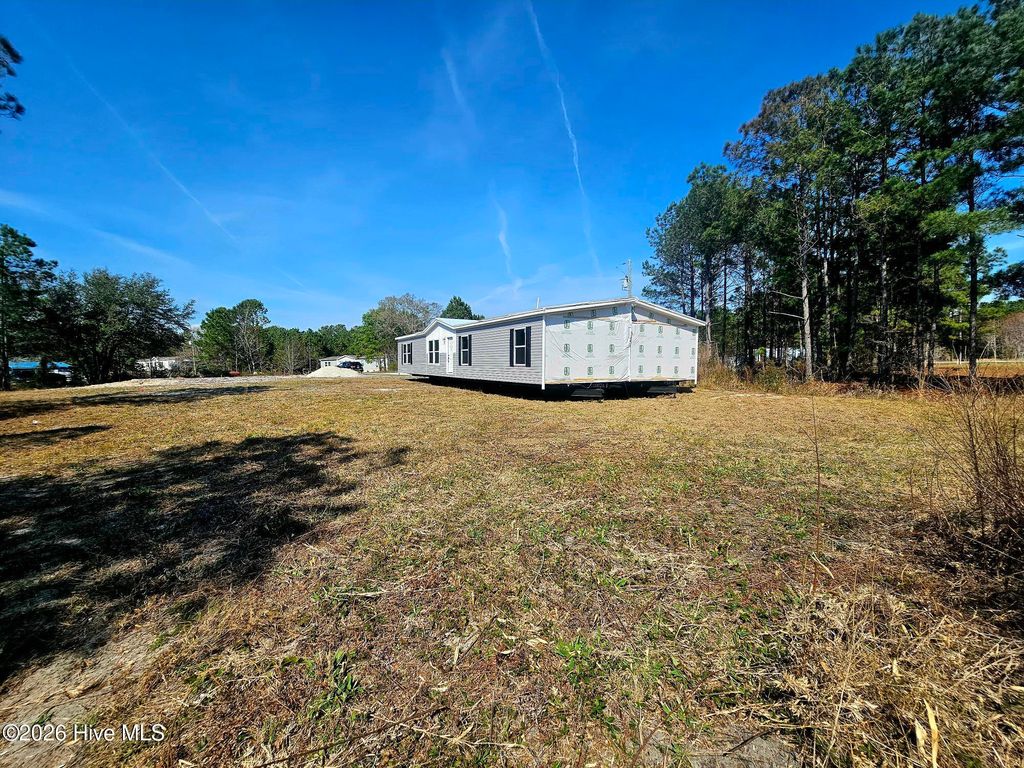 Photo of 109 Mockingbird Lane, Holly Ridge, NC 28445 (MLS # 100565039)