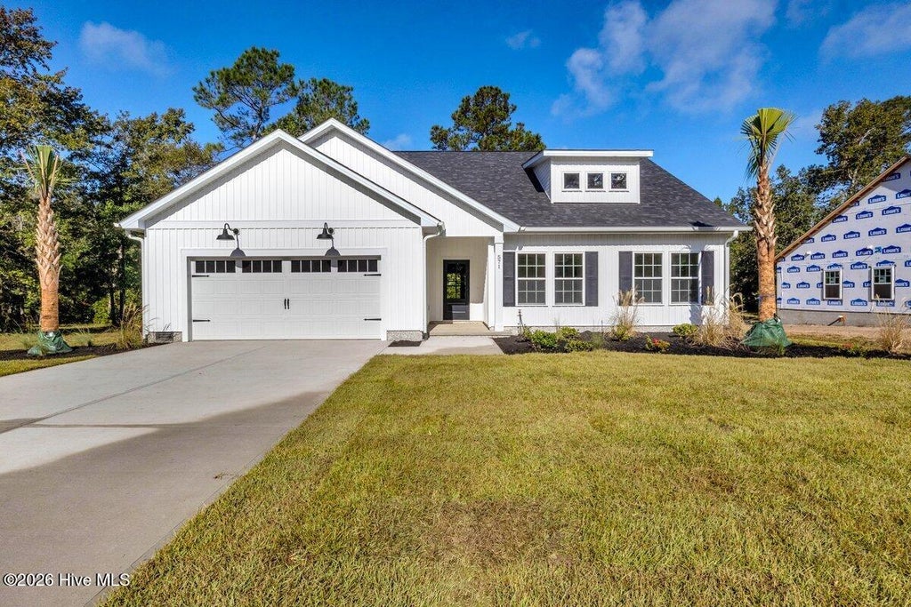 Photo of 571 Sanctuary Point SW, Supply, NC 28462 (MLS # 100608663)