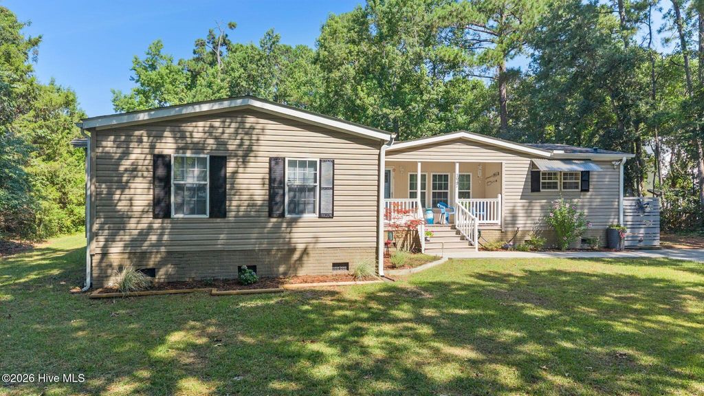 Photo of 1947 Sloop Point Loop Road, Hampstead, NC 28443 (MLS # 100589584)