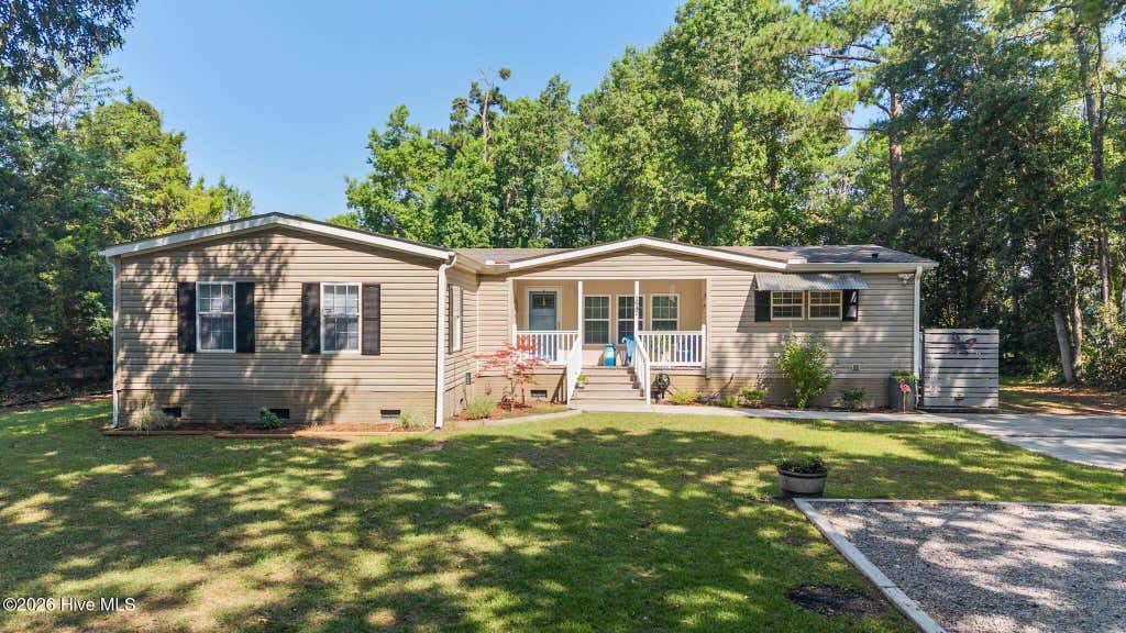 Photo of 1947 Sloop Point Loop Road, Hampstead, NC 28443 (MLS # 100589584)