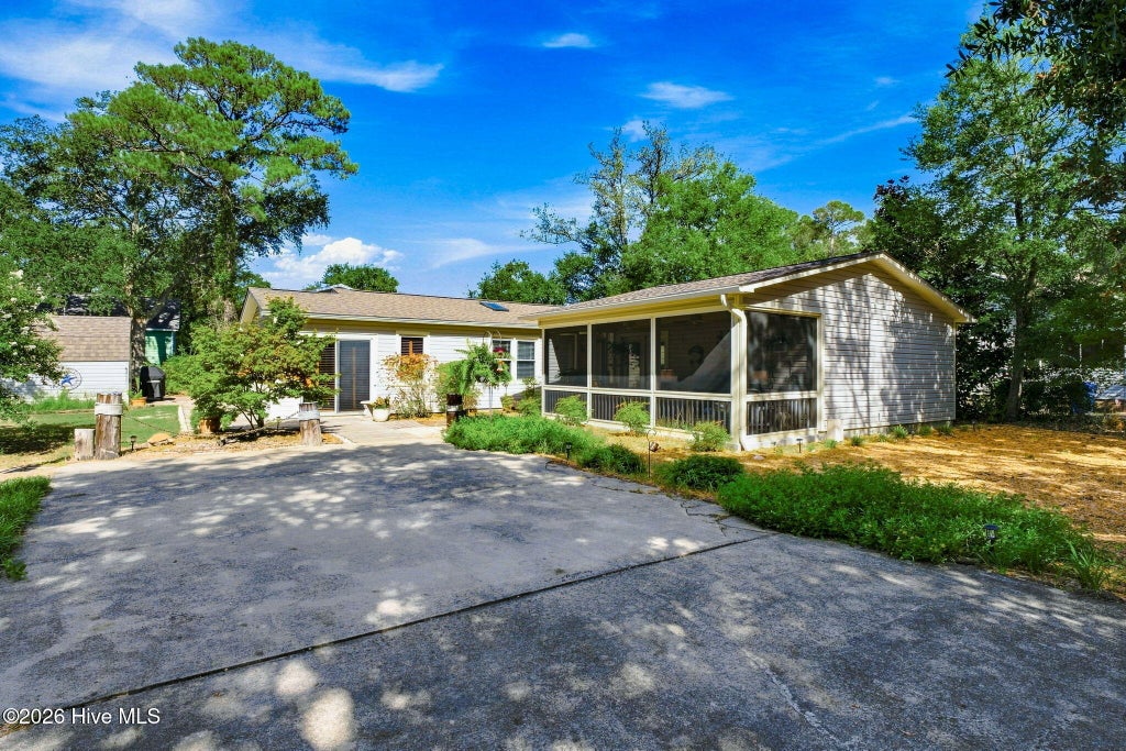 Photo of 315 NE 40th Street, Oak Island, NC 28465 (MLS # 100603123)