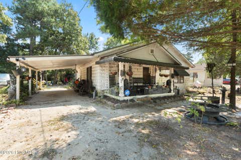 Photo of 201 Lee'S Mill Road, Laurinburg, NC 28352 (MLS # 100593984)